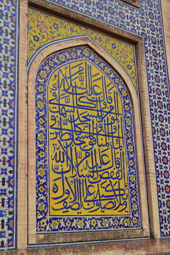  LAHORE, PAKISTAN, JULY 05, 2018: precious calligraphy written on the wall of masjid wazir khan, mosque