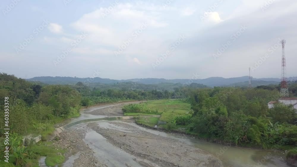 a view of rice fields and river a view of rice fields and river