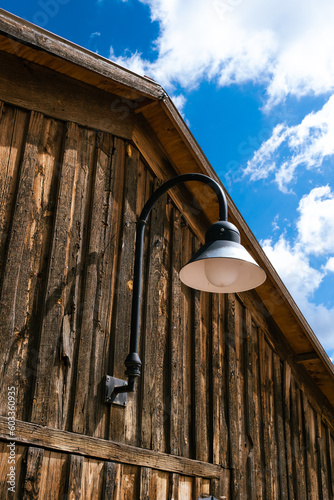 Wooden Barn House and a Lamp