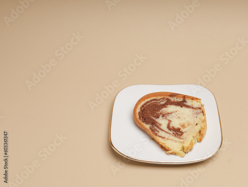 Butter marbled cake on the table, sliced and served at tea time