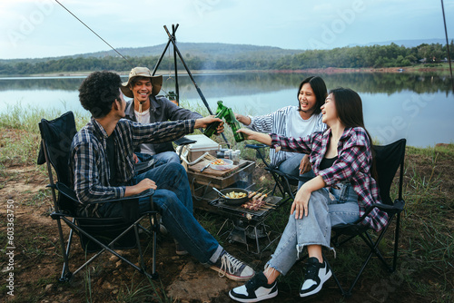 Canvas Print Asian LGBTQ+ couple drinking and barbecue in a romantic camping setting
