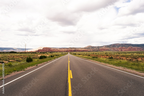  The road on the red mountains in The Ghost Ranch, New Mexico photo