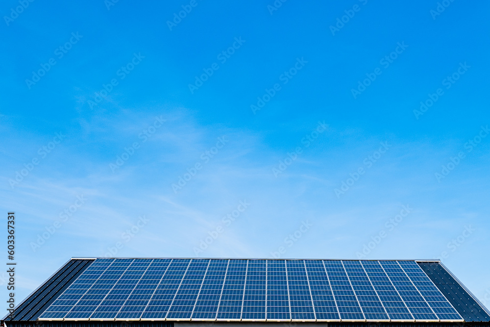 Modern building with solar panels on roof Modern building with solar panels on roof