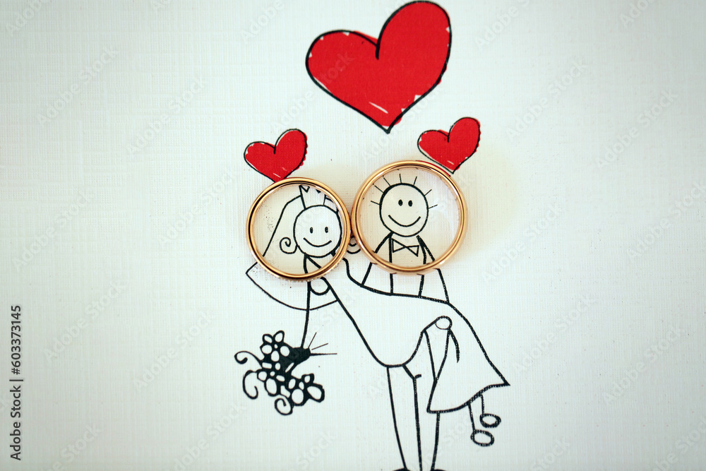Wedding rings placed on the faces of bride and groom illustration Wedding rings placed on the faces of bride and groom illustration