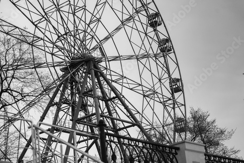 giant observation wheel in amusement park . High quality photo