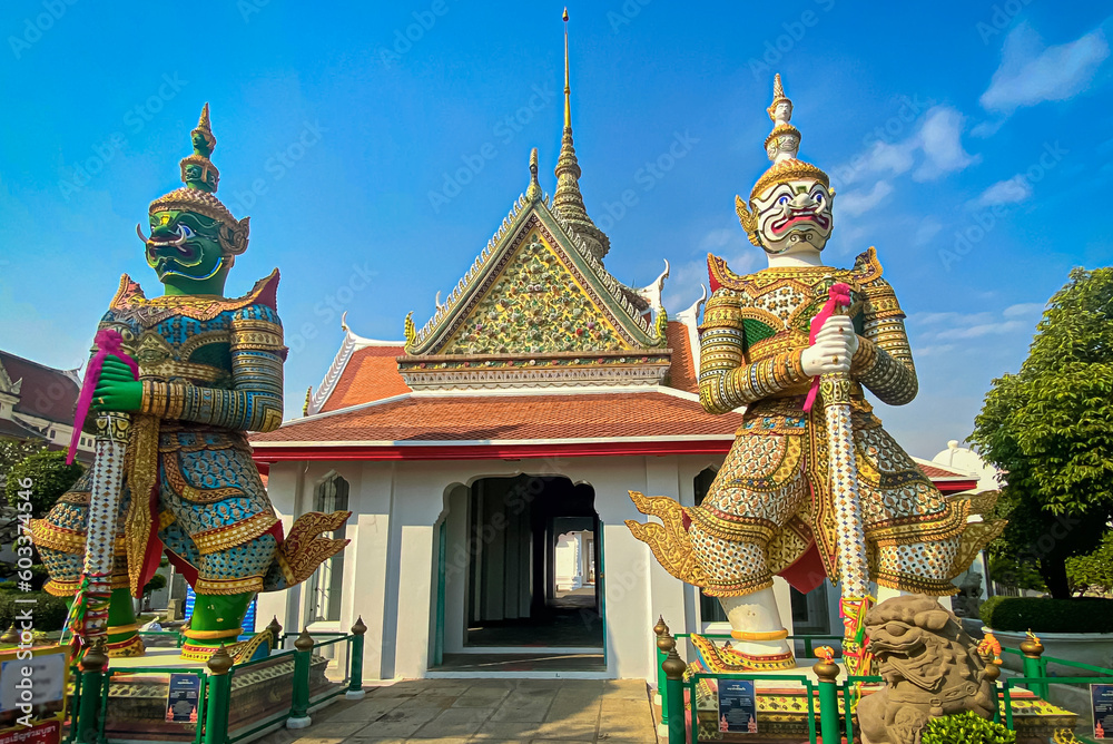 Fototapeta premium The visiting card of the capital of Thailand is the Buddhist temple Wat Arun, Temple of Dawn, which is located on the banks of the Chao Phraya River