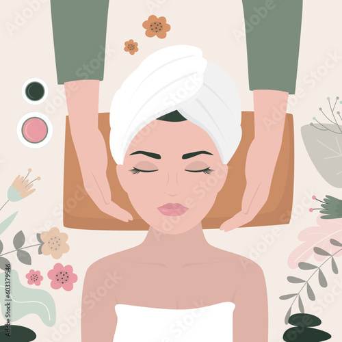 Young woman enjoying relaxing facial massage treatment. Woman lying on back while masseur massaging her face. Facial treatments. Spa face massage. Happy girl portrait.
