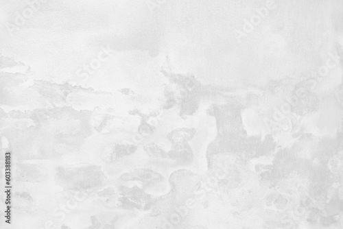 White grey old wall with shabby damaged plaster Cement abstract background of an vintage dirty wall space forTextured background