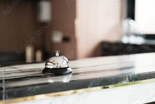 Hotel reception counter desk with service bell. front desk bell for call staff service.