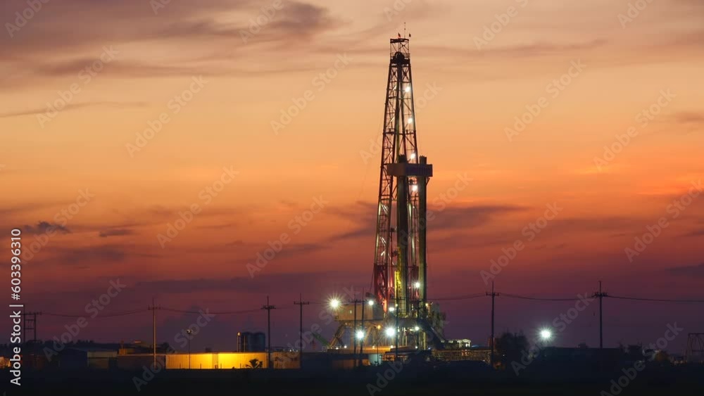 Sunset oil drilling rig in the field Time lapse Sunset oil drilling rig in the field Time lapse