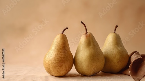  three pears and a brown cloth on a beige background. generative ai