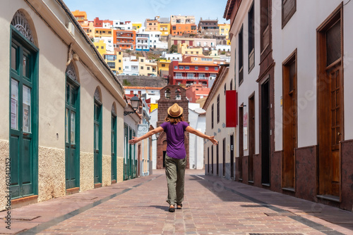 Lifestyle, vacations walking through the city of San Sebastian de la Gomera next to the Iglesia De La Asuncion, Canary Islands