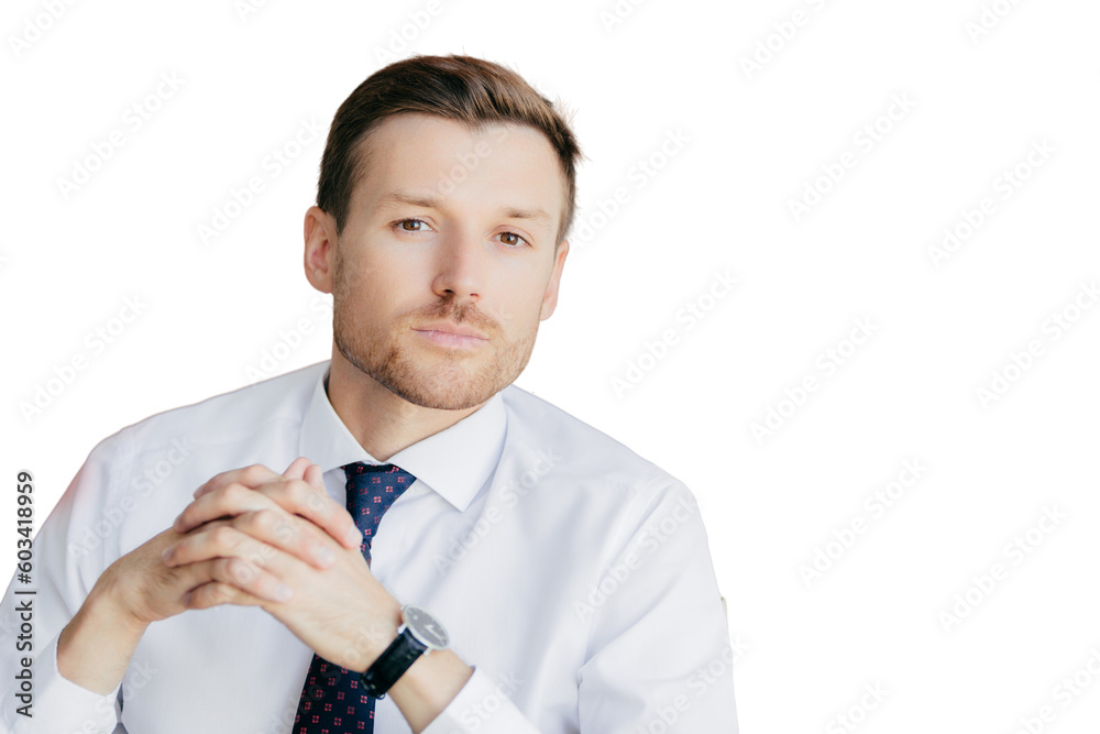 Portrait of handsome male employee has stubble, holds hands together, looks thoughtfully at camera, contemplates about business project, poses against red and white background with copy space Portrait of handsome male employee has stubble, holds hands together, looks thoughtfully at camera, contemplates about business project, poses against red and white background with copy space
