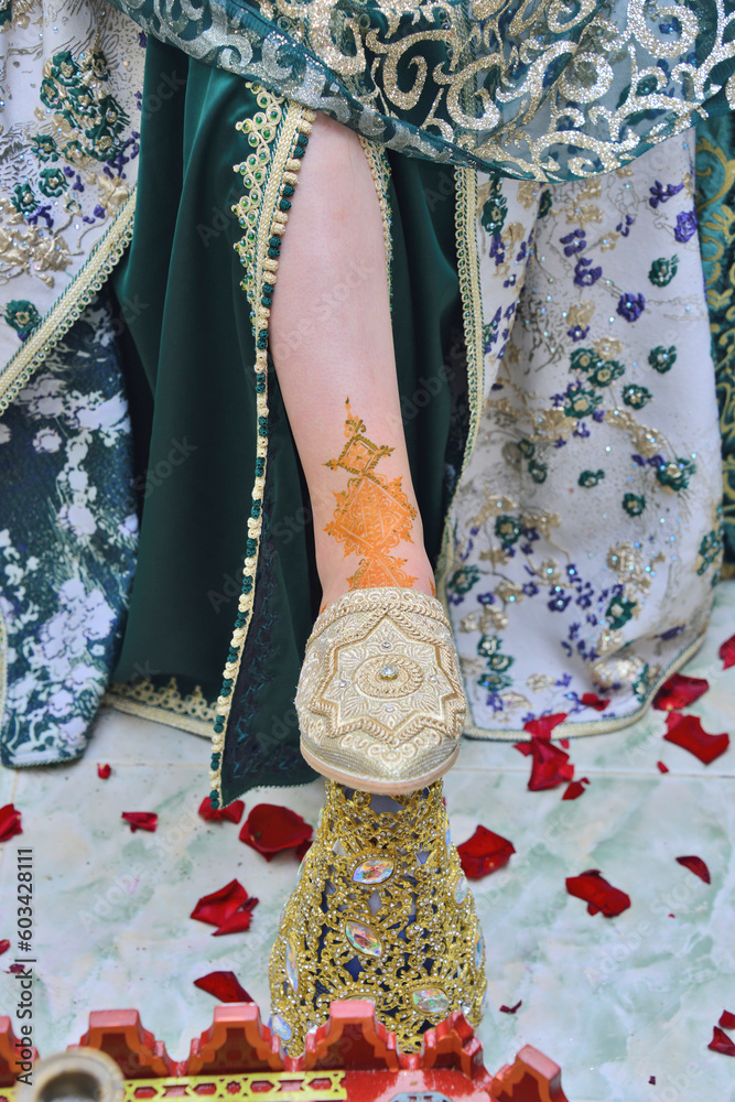 Moroccan henna tattoo on foot.