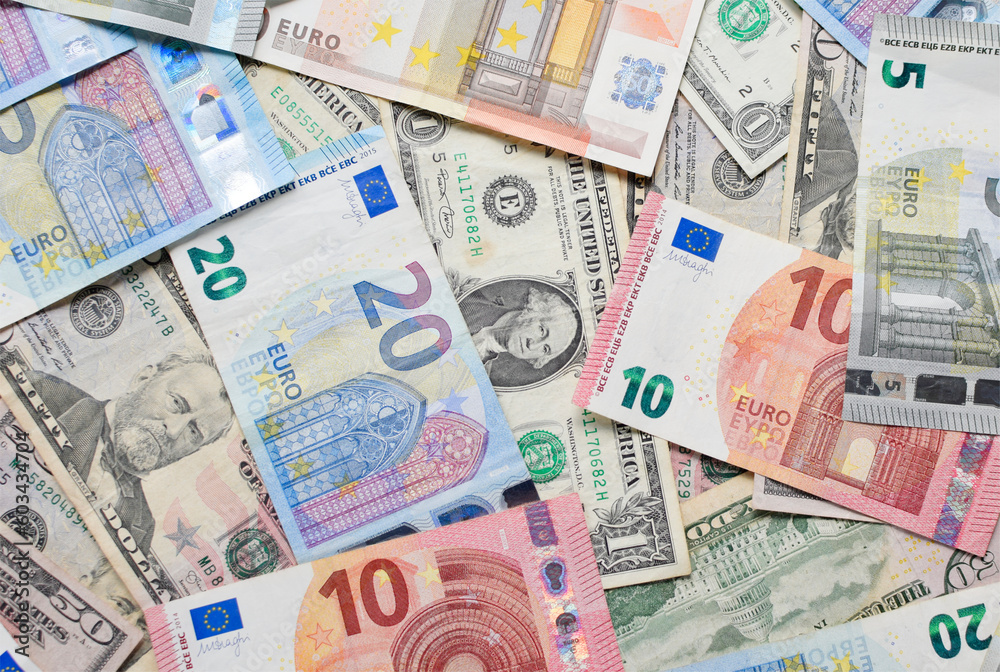 Money background. Euro and dollar banknotes background.
