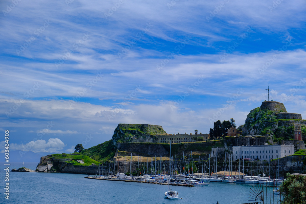 Naklejka premium Old Fortress of Corfu island in Greece with Sail Boats in the foreground