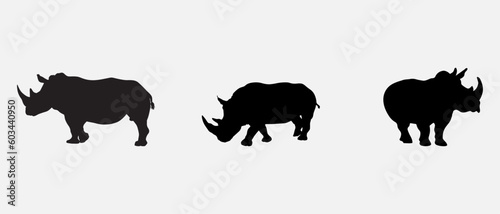 isolated black silhouette of a rhinoceros , vector collection