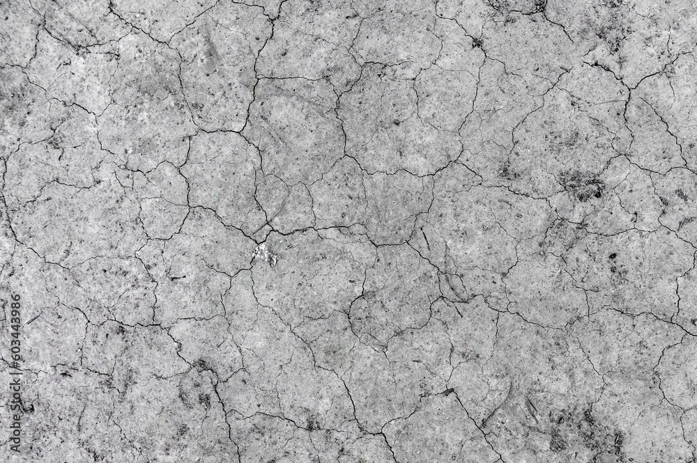 Ground cracked by hot weather. Global warming and drought concept. Ground cracked by hot weather. Global warming and drought concept.