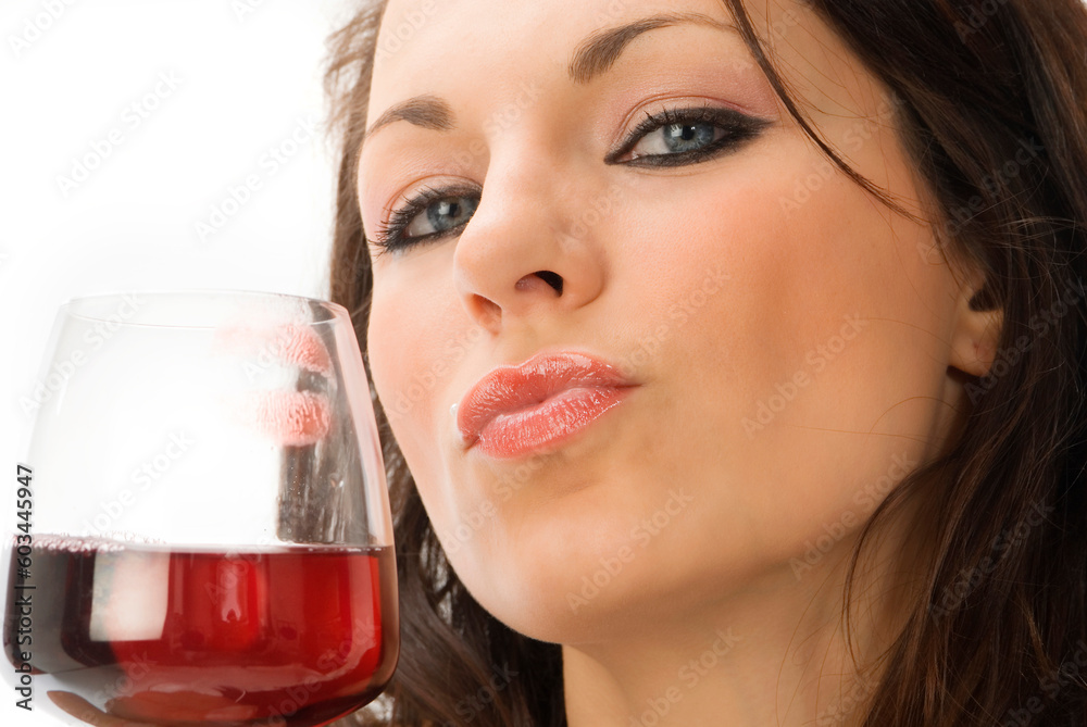 a nice close up of cute and young brunette in a black dress with a glass of italian red wine a nice close up of cute and young brunette in a black dress with a glass of italian red wine