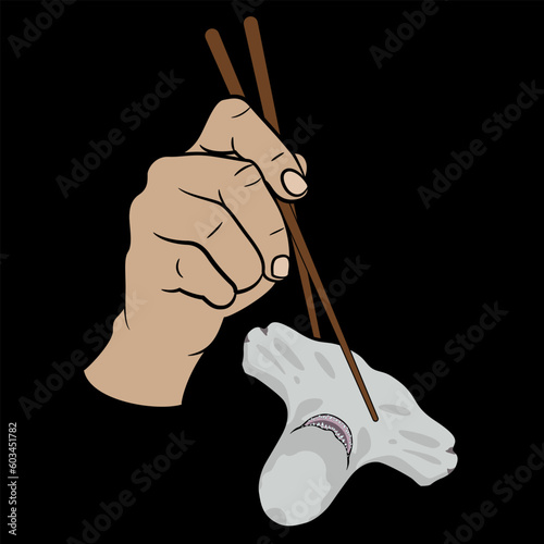 Human hand holding a head of hammerhead shark with chopsticks. Creative seafood design. On black background.