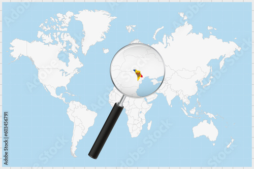 Magnifying glass showing a map of Moldova on a world map.