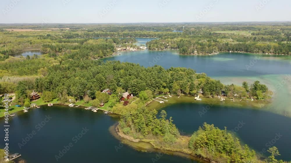 Aerial view of Chain O' Lakes-King, Wisconsin. Serene lakes, scenic nature, and outdoor activities. Perfect for boating, fishing Aerial view of Chain O' Lakes-King, Wisconsin. Serene lakes, scenic nature, and outdoor activities. Perfect for boating, fishing