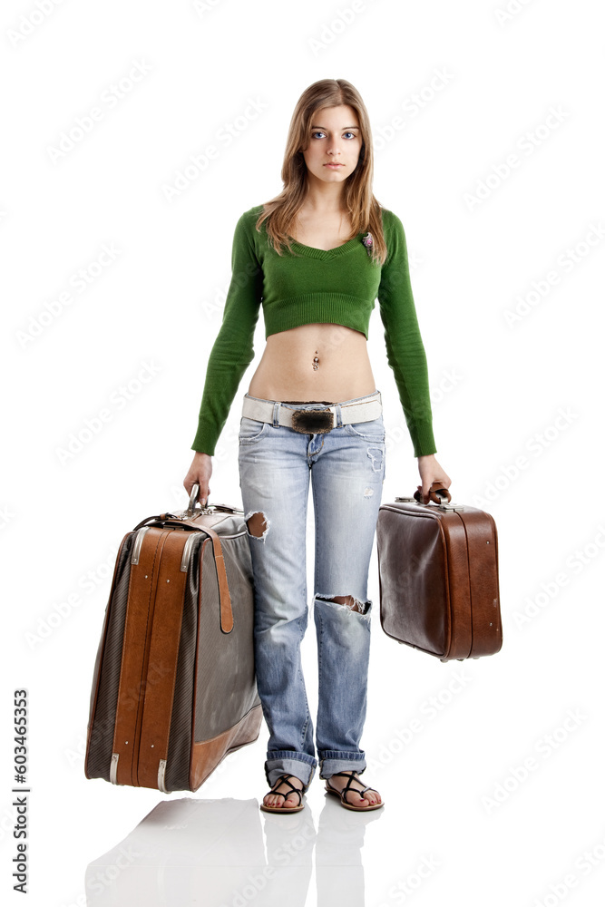 Beautiful young woman holding two old leather suitcases Beautiful young woman holding two old leather suitcases
