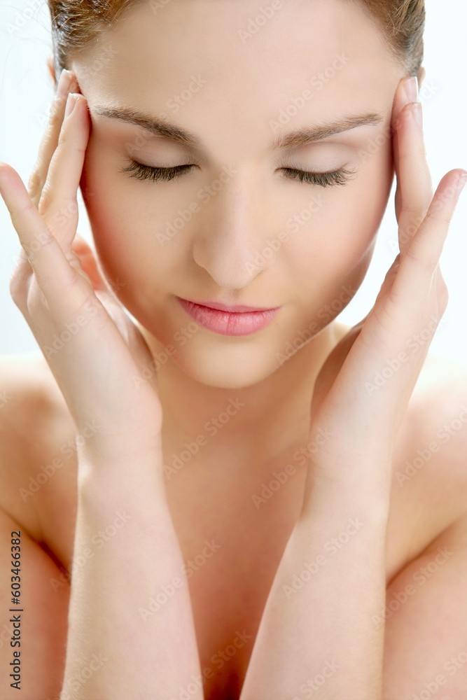 Portrait of young beautiful woman with clean skin at studio Portrait of young beautiful woman with clean skin at studio