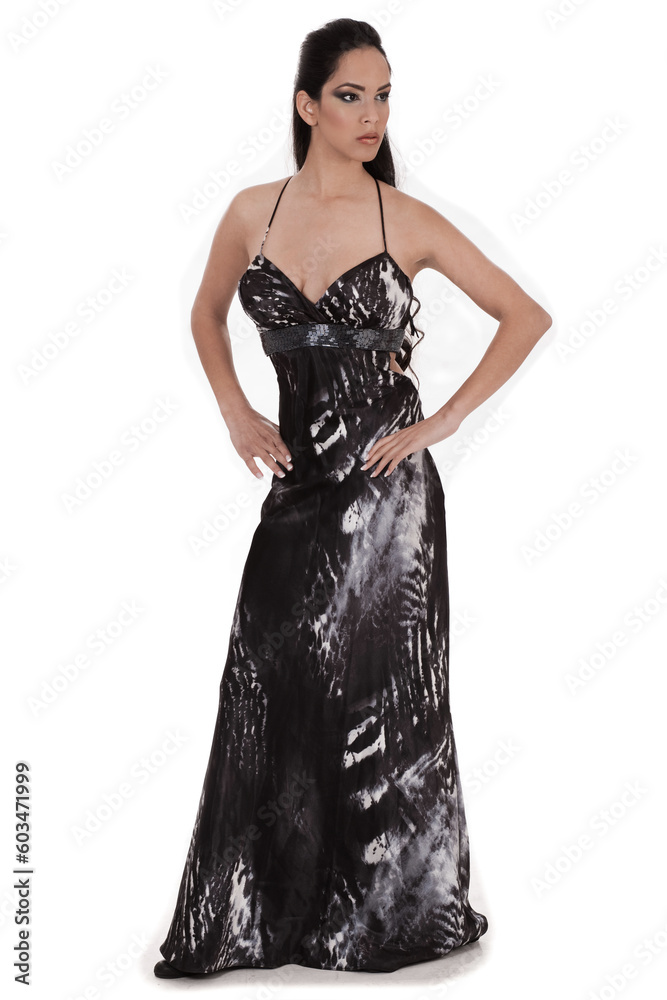 Beautiful woman in a full black costume over white background