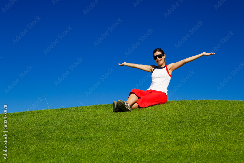Outdoor portrait of a beautiful young woman enjoying the spring Outdoor portrait of a beautiful young woman enjoying the spring