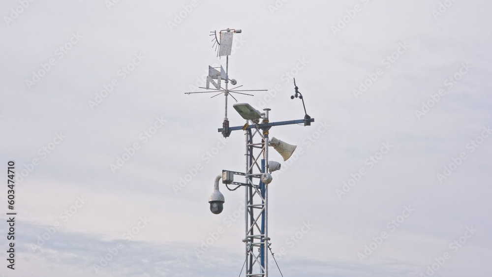 Tall Truss Construction Metal Mast with Meteorological Sensors and Surveillance CCTV Camera Equipment Tall Truss Construction Metal Mast with Meteorological Sensors and Surveillance CCTV Camera Equipment