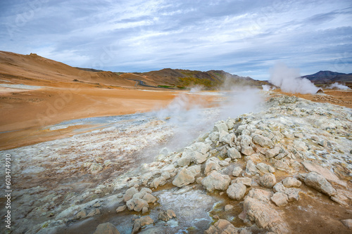 Hverir geothermal area with boiling mudpools and fumaroles, with its Mars like landscape, north Iceland photo