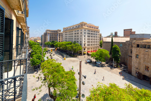 View from a hotel balcony overlooking the Plaza de la Seu in front of the Gothic Barcelona Cathedral in the Gothic Quarter center of Barcelona Spain.