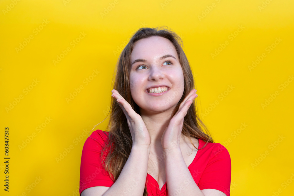 Closeup photo of amazing lady looking up empty space thinking creative person wear casual isolated yellow color background Closeup photo of amazing lady looking up empty space thinking creative person wear casual isolated yellow color background