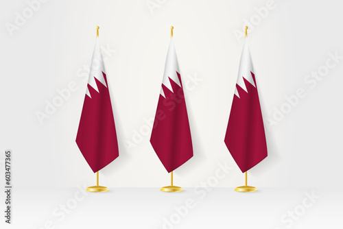Three Qatar flags in a row on a golden stand, illustration of press conference and other meetings.