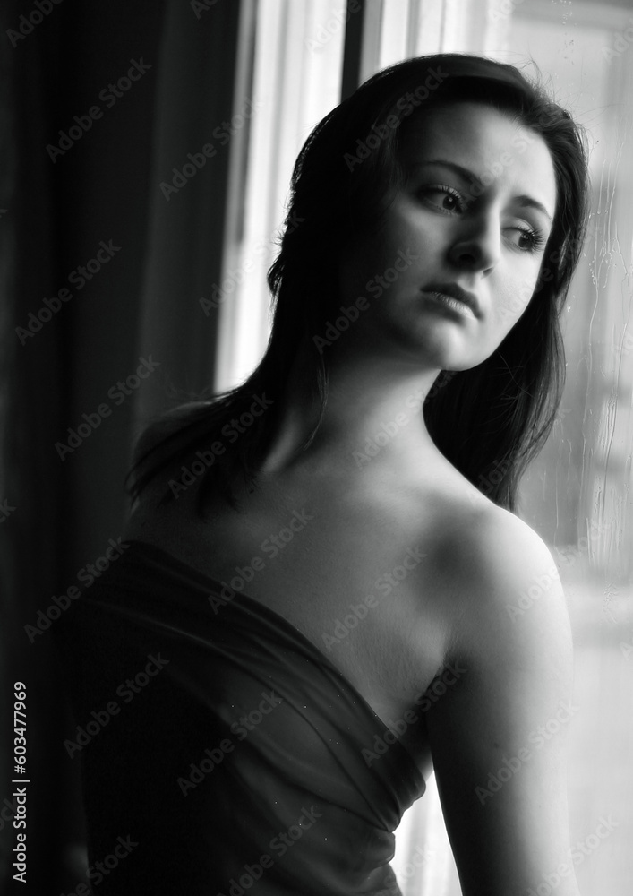 The girl looking out of the window The girl looking out of the window