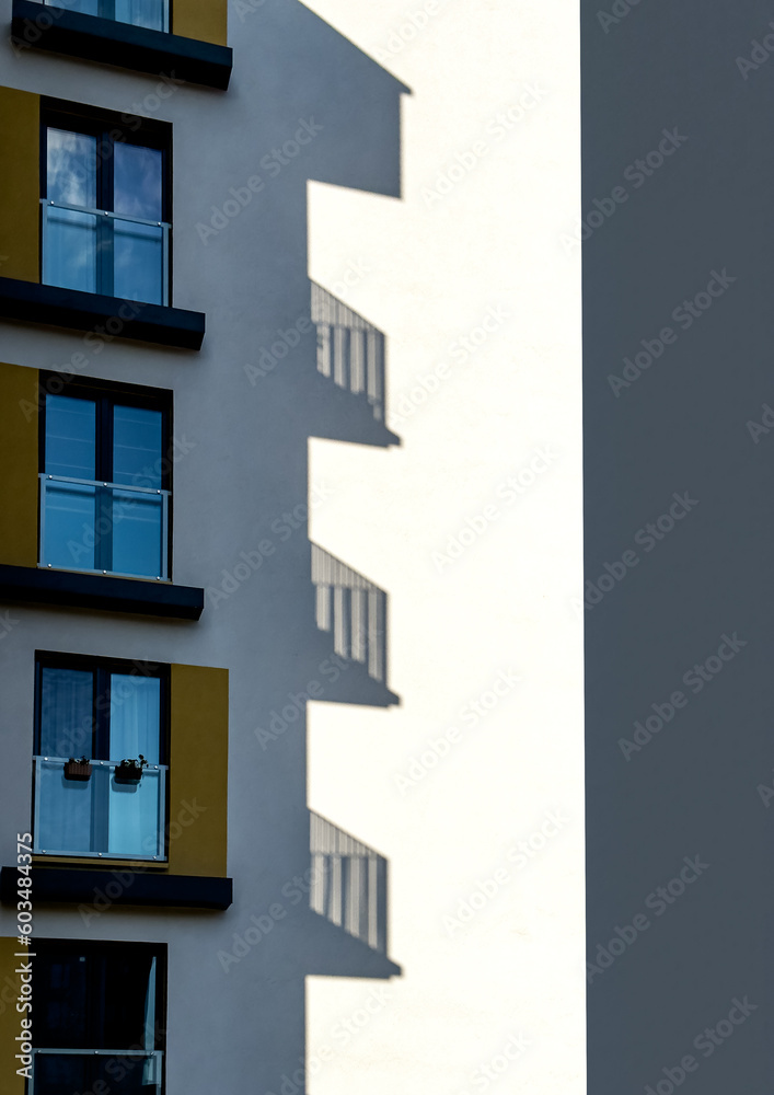 Architecture, shadow and light on wall on sunny day