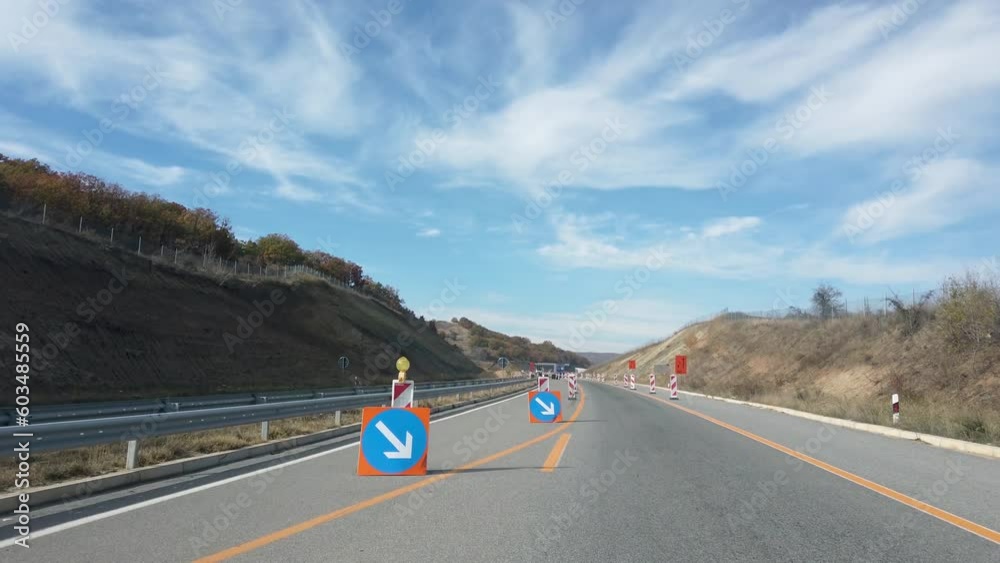 Restricted Line Vidéo Stock Highway drive pov. road construction on a highway with ...