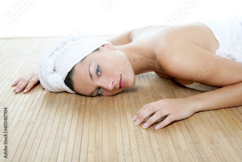 Beautiful spa blue eyes woman relax over white background