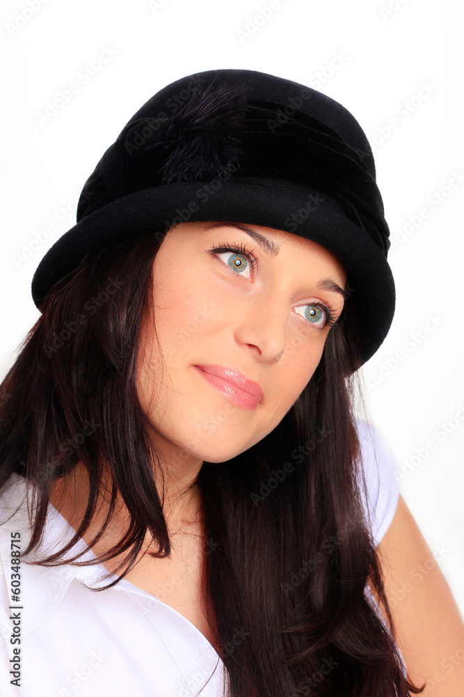 Young woman with black hat and black hair