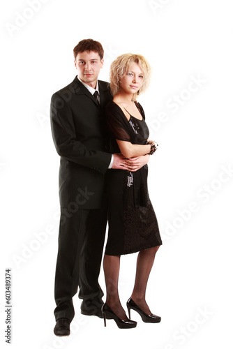 Image of the young couple posing on white