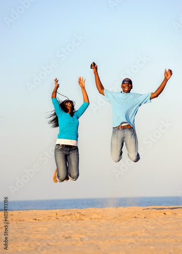 African American couple having fun at the beach