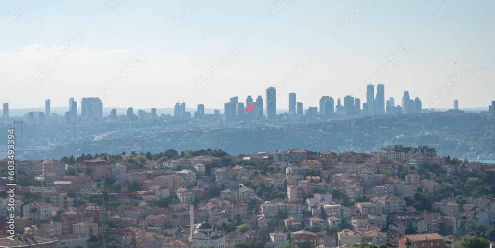 Panoramic view from the mountain to the city on a summer day in a sunny haze. Istanbul, Turkey