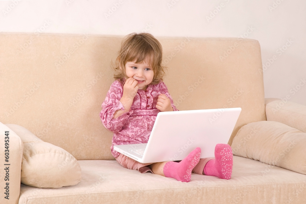 young girl using a laptop. computer generation young girl using a laptop. computer generation