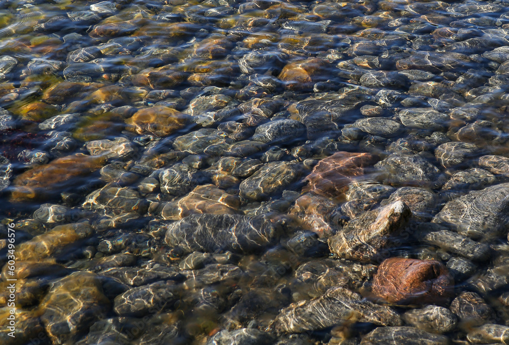 Baltic sea shore view with many small rocks under water near cost. Baltic sea shore view with many small rocks under water near cost.