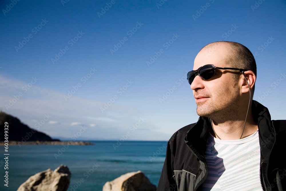 Man In Sunglasses Near The Ocean