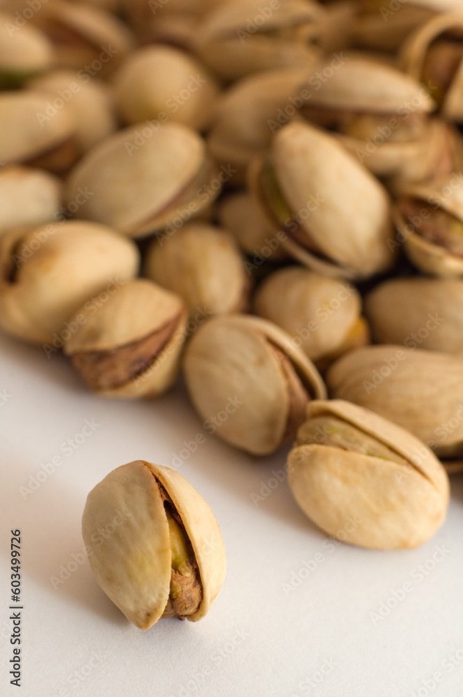 multiple salted pistachios, warm brown color, distance blur multiple salted pistachios, warm brown color, distance blur