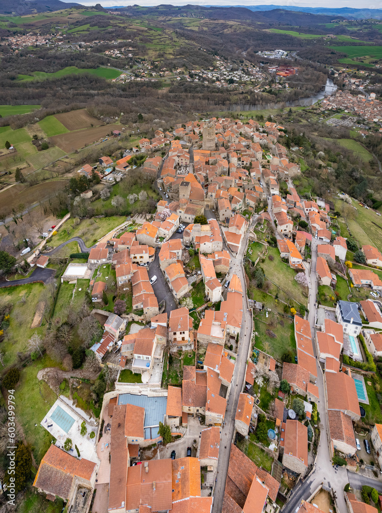 Aerial above the old town of Montpeyroux in France on a sunny day in early spring.