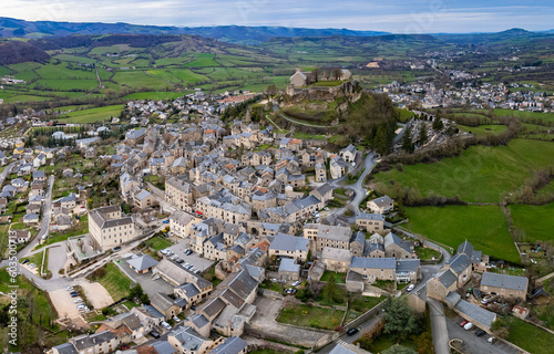 Aerial view of the old town of Sévérac-d'Aveyron in France on a sunny afternoon in spring.