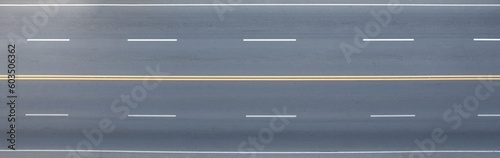 Empty asphalt highway road lanes above top drone view photo